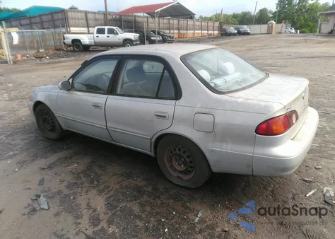 2001 Toyota Corolla Le z USA, uszkodzony, nr VIN 1NXBR12EX1Z556447